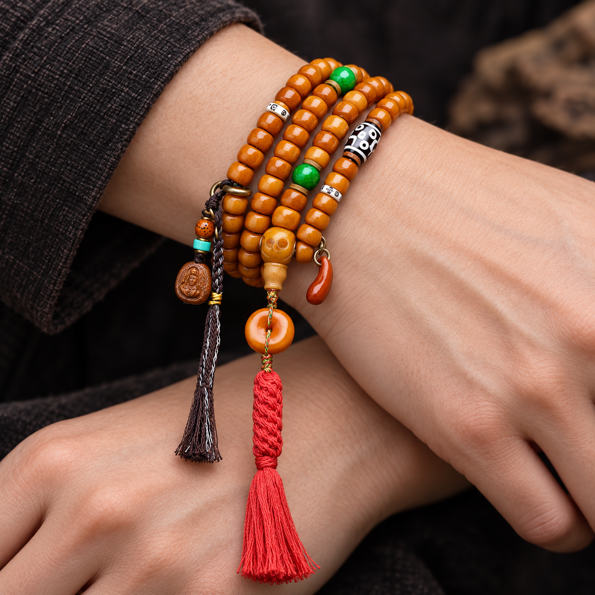 EverestArtstudios Yak Bone 108-Bead Mala in Four Decorative Styles — wrist crossed