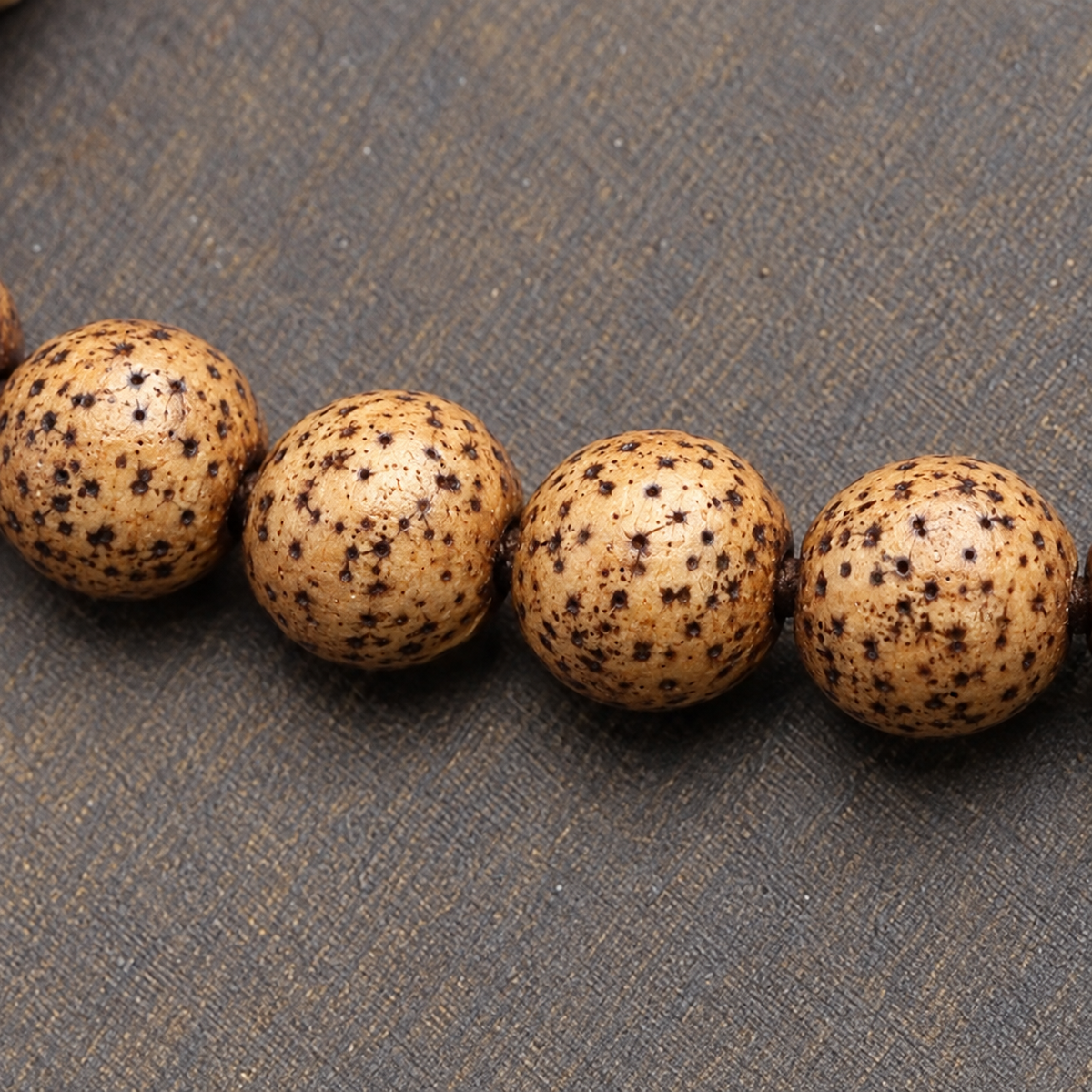 EverestArtstudios Textured Xingyue Bodhi 108-Bead Mala with Coral and Yak Bone Accents — surface detail