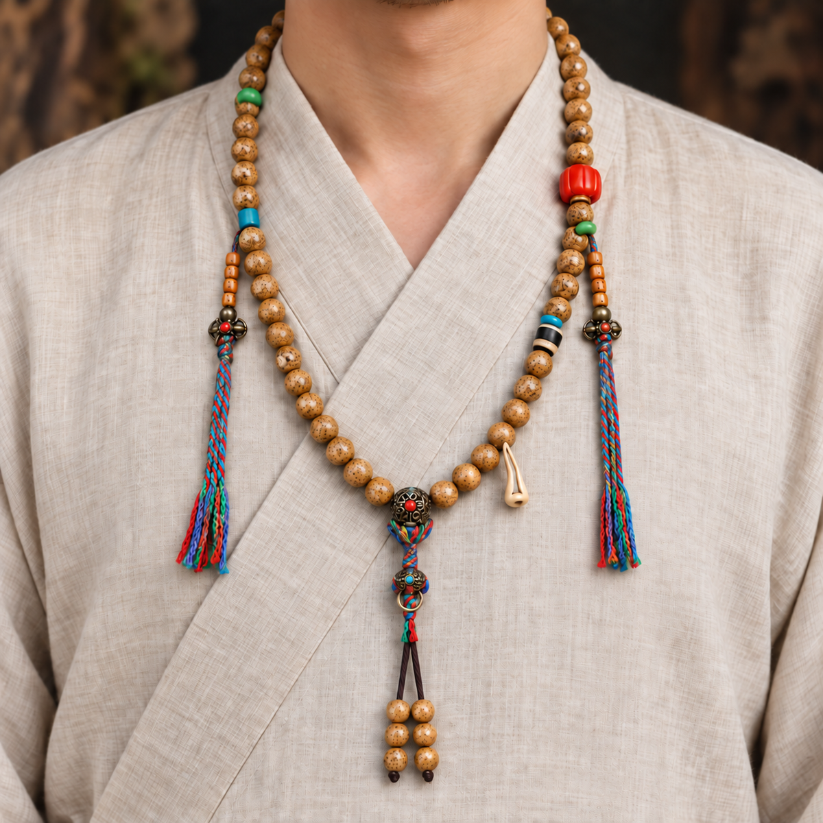 EverestArtstudios Textured Xingyue Bodhi 108-Bead Mala with Coral and Yak Bone Accents — linen front