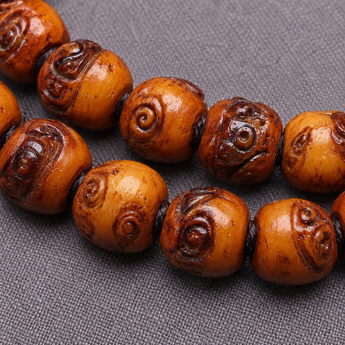 EverestArtstudios Carved Camel Bone 108-Bead Mala with Yak Bone and Agate Accents — bead detail