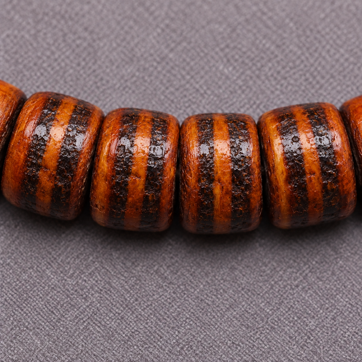 EverestArtstudios Yak Bone 108-Bead Mala with Wealth Deity and Mantra Motifs — surface detail