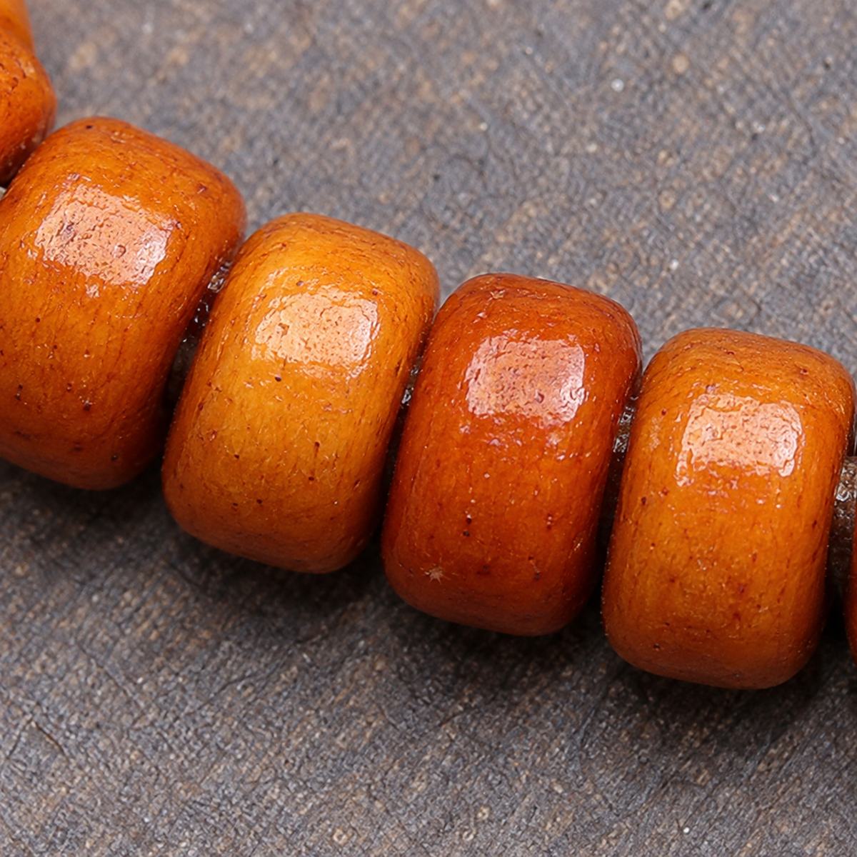 EverestArtstudios Yak Bone 108-Bead Mala with Lotus and Vajra Bodhi Accents — surface detail