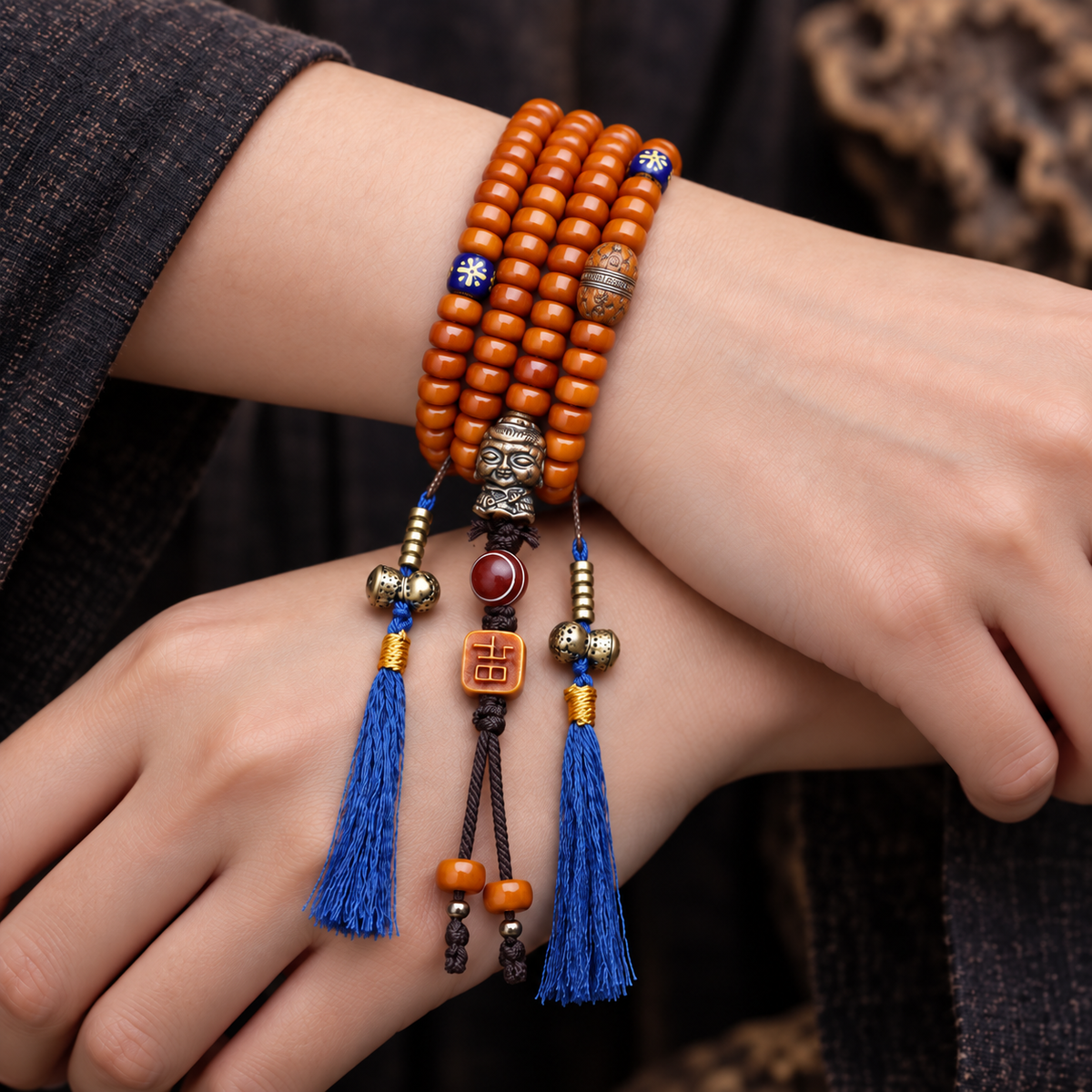 EverestArtstudios Yak Bone 108-Bead Mala with Lotus and Vajra Bodhi Accents — wrist crossed