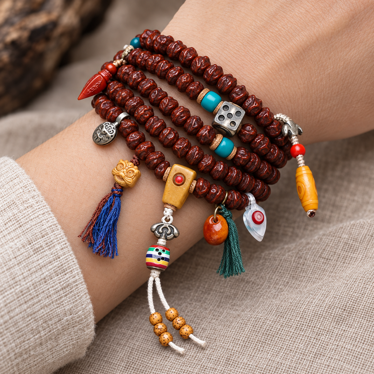 EverestArtstudios Bodhi Seed 108-Bead Mala with Dzi-Style and Vajra Motif Accents — wrist resting
