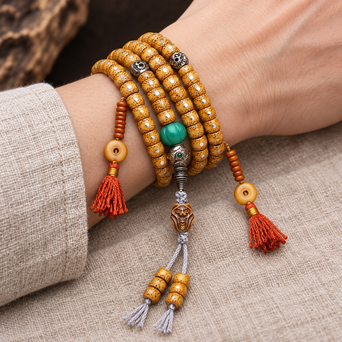 EverestArtstudios Textured Xingyue Bodhi 108-Bead Mala with Bone Accents — wrist resting