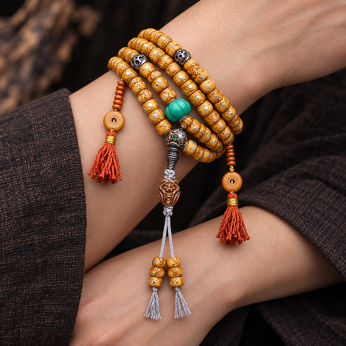 EverestArtstudios Textured Xingyue Bodhi 108-Bead Mala with Bone Accents — wrist crossed