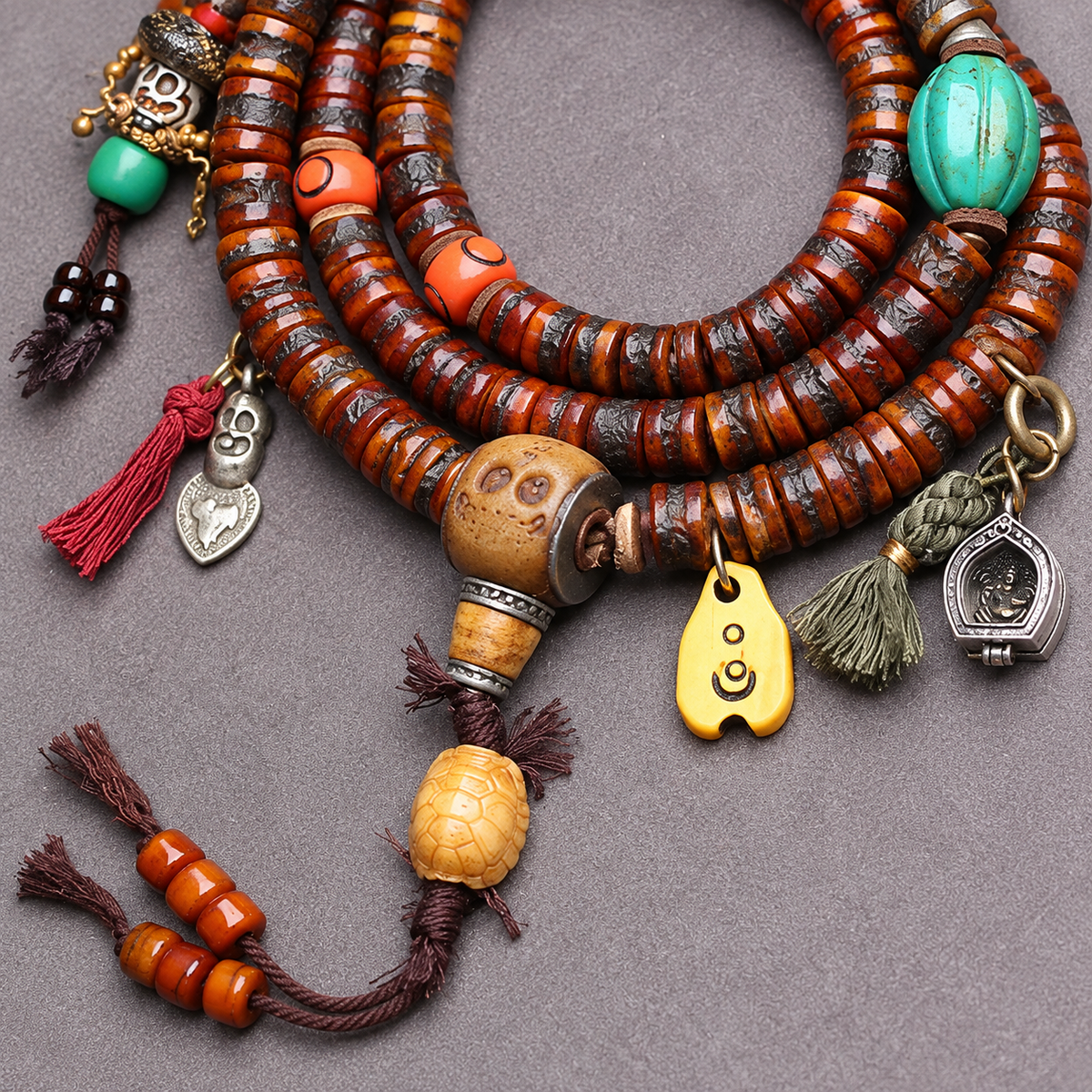 EverestArtstudios Yak Bone 108-Bead Mala with Ghau Pendant and Hanging Charm — connection detail