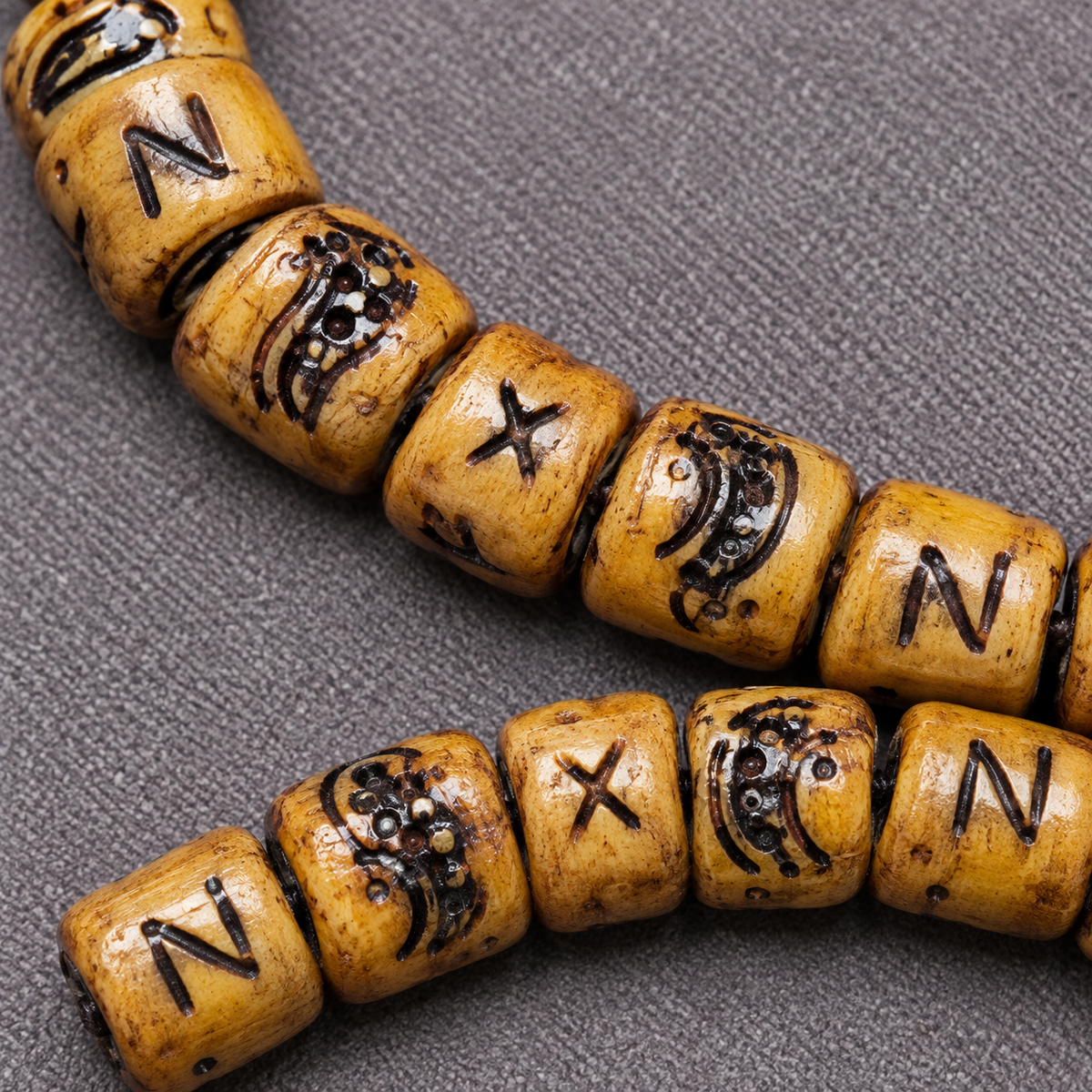 EverestArtstudios Carved Yak Bone 108-Bead Mala with Camel Bone, Glass and Agate Accents — bead detail