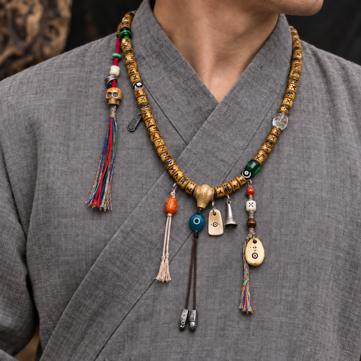 EverestArtstudios Carved Yak Bone 108-Bead Mala with Camel Bone, Glass and Agate Accents — linen side