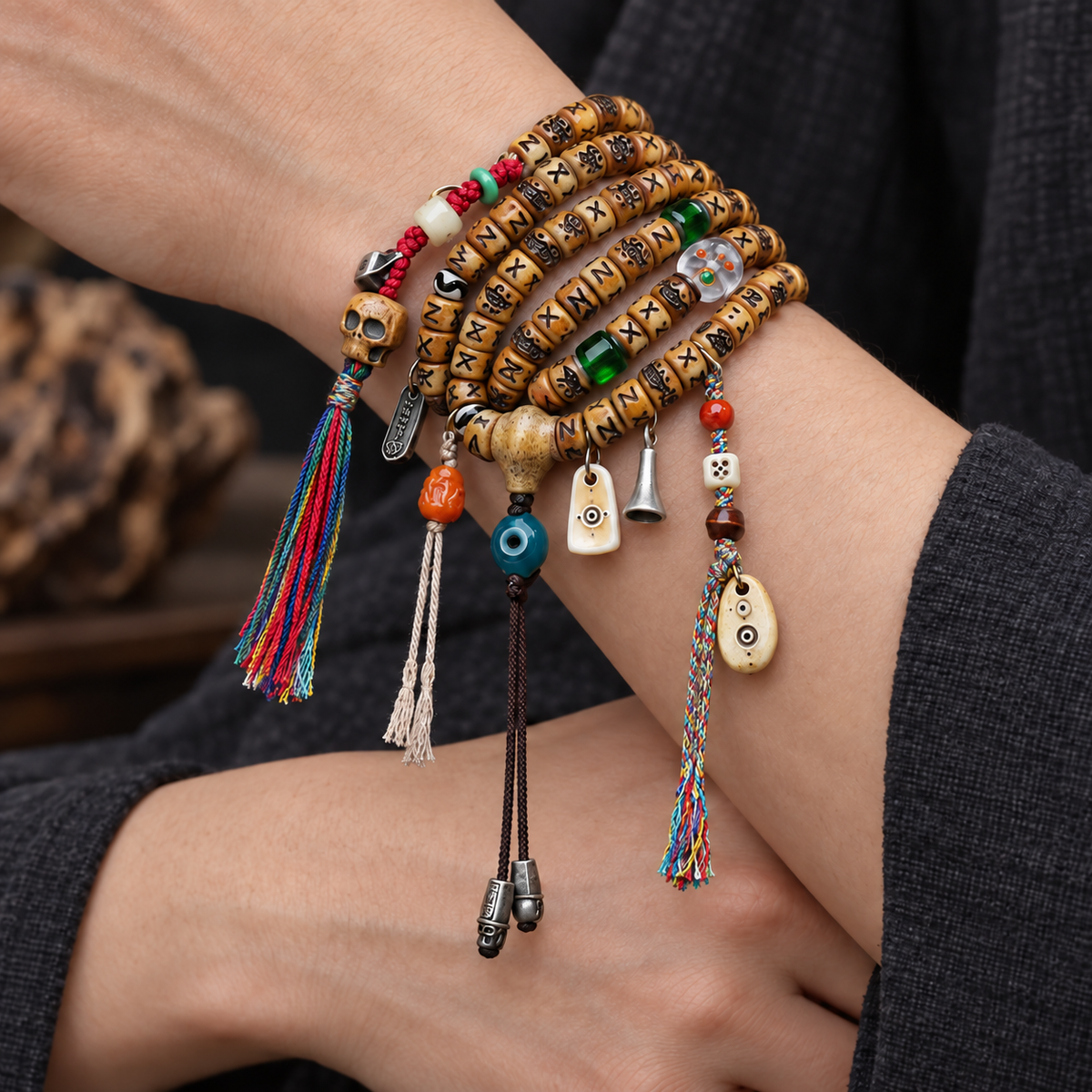 EverestArtstudios Carved Yak Bone 108-Bead Mala with Camel Bone, Glass and Agate Accents — wrist crossed