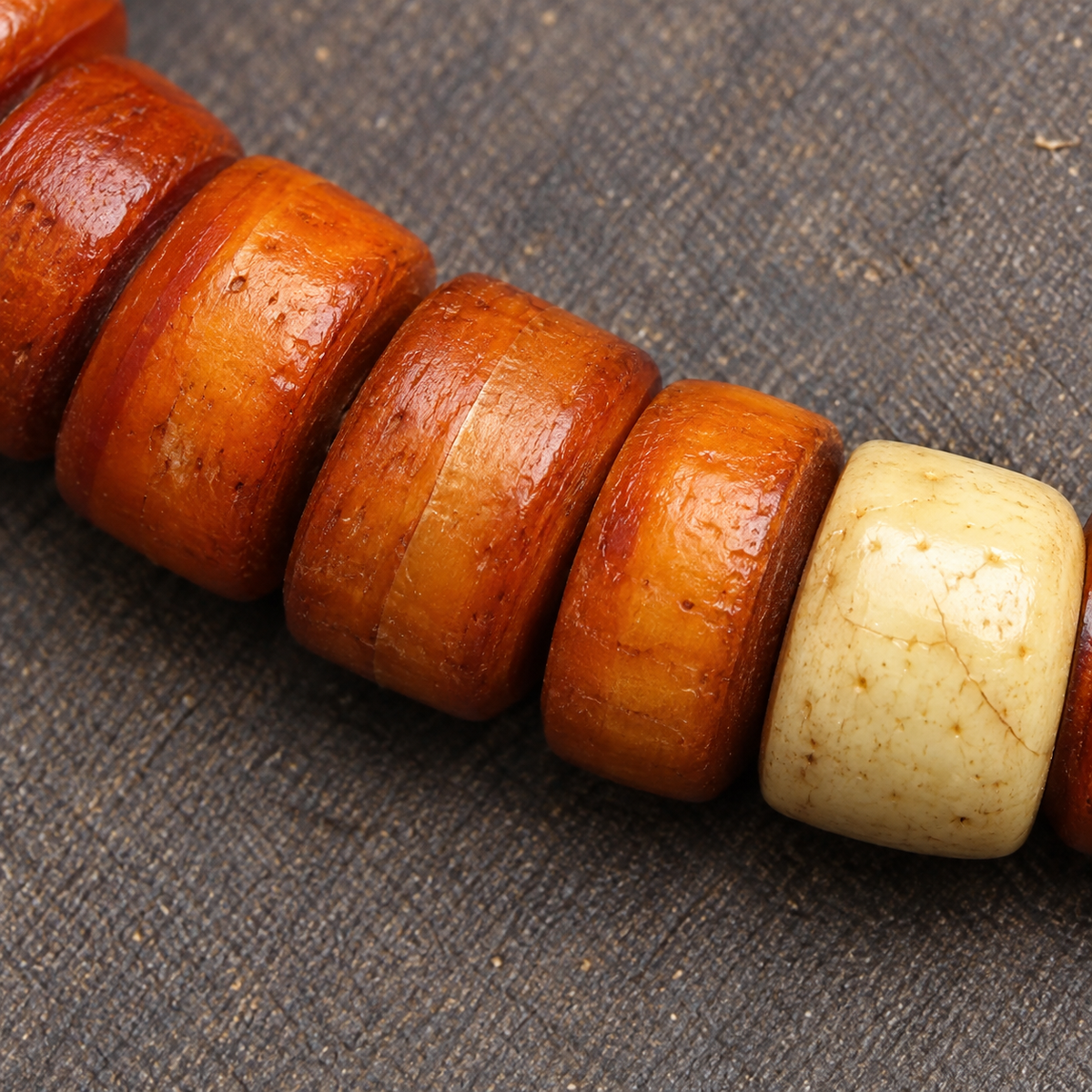 EverestArtstudios Bone 108-Bead Mala with Carved and Metal-Tone Accents — surface detail