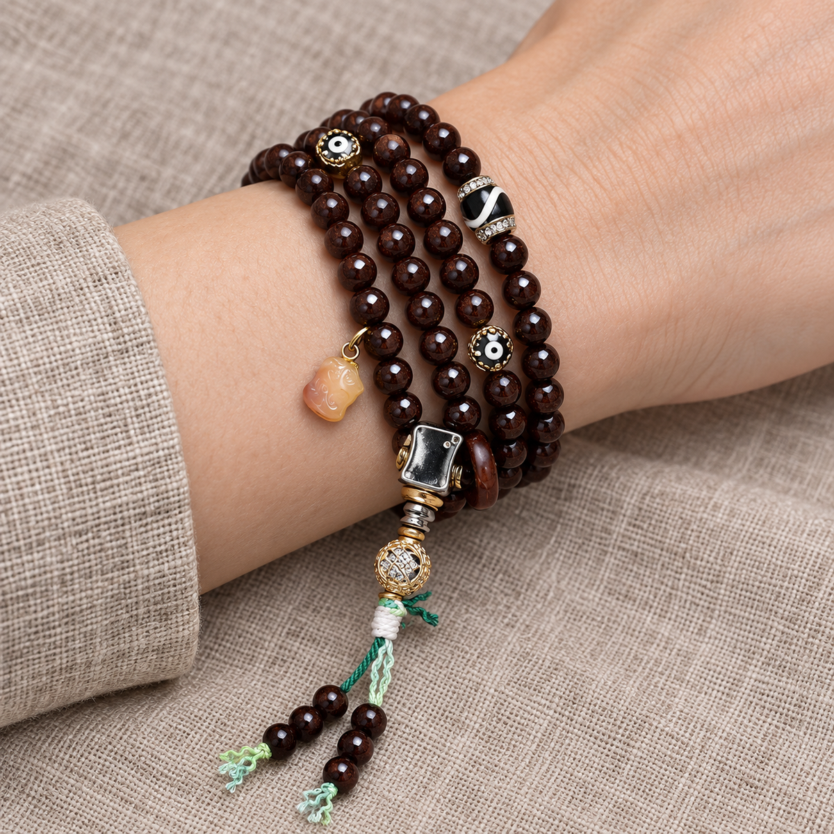 EverestArtstudios Coconut 108-Bead Mala with Inlaid Agate Accents — wrist resting