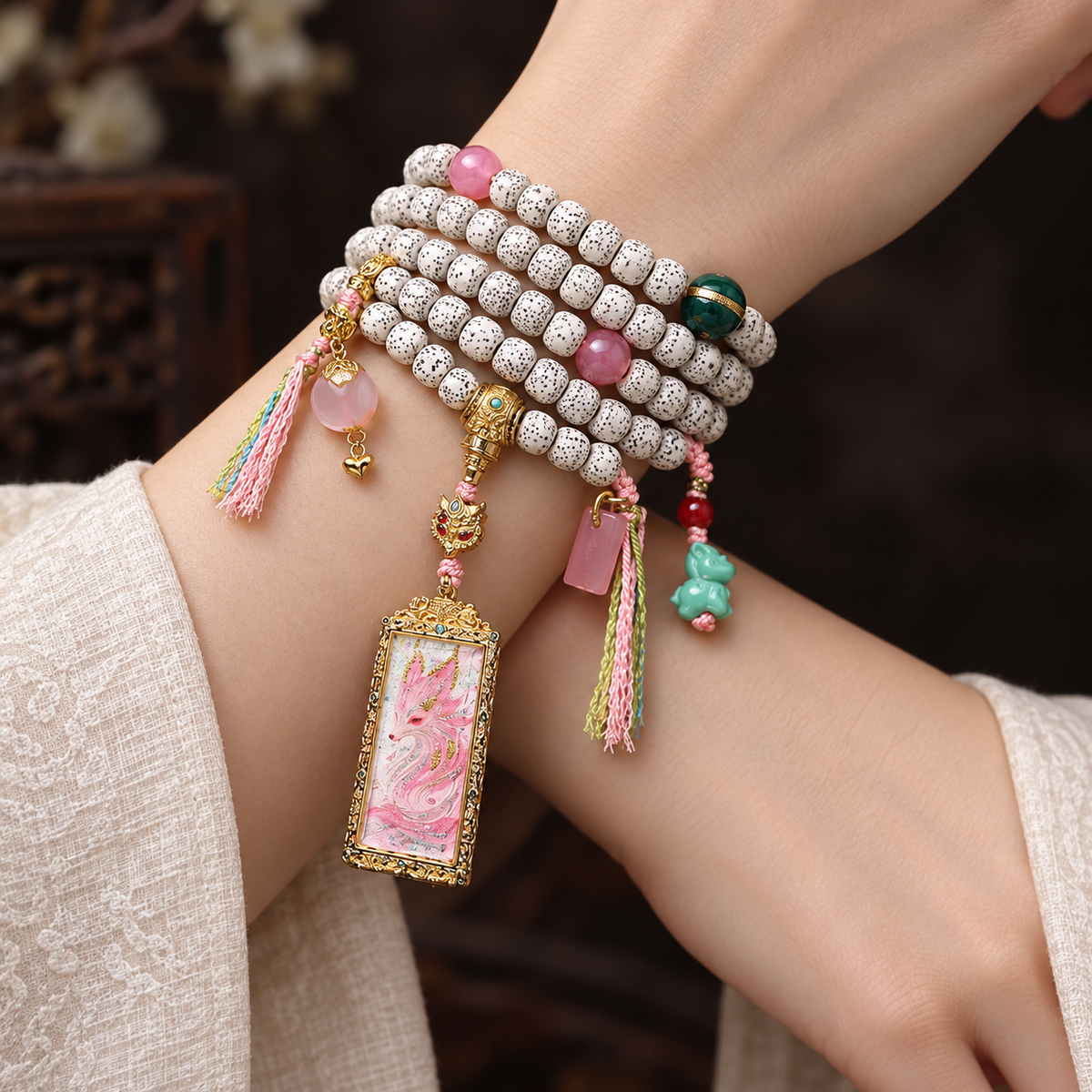 EverestArtstudios Xingyue Bodhi 108-Bead Mala with Nine-Tailed Fox Thangka-Style Pendant — wrist crossed