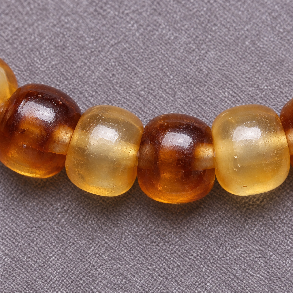 EverestArtstudios Golden Armor Barrel-Bead Mala with Vajra Bodhi and Horn Accents — surface detail