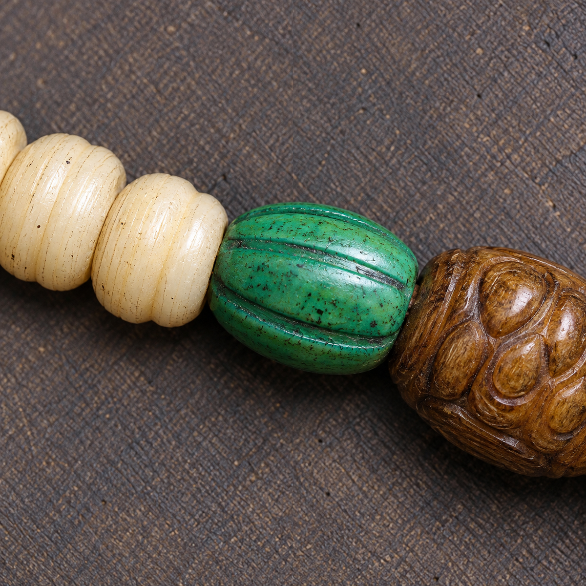 EverestArtstudios Camel Bone 108-Bead Mala with Bagua Motif and Tassels — surface detail