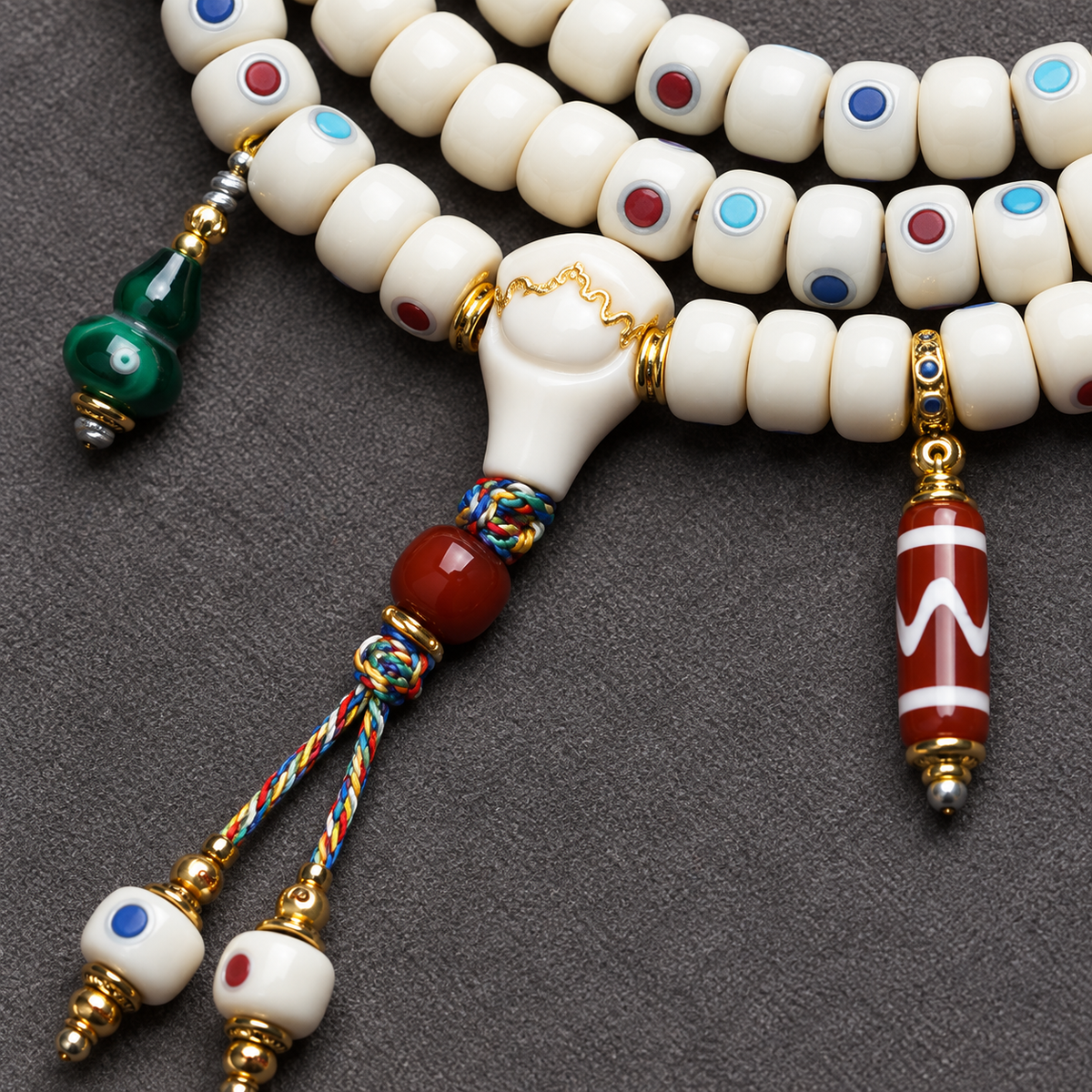 EverestArtstudios Inlaid Deer Bone 108-Bead Mala with Agate and Coconut Accents — connection detail