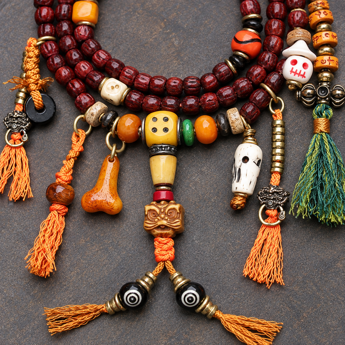 EverestArtstudios Cut Bodhi Seed 108-Bead Mala with Pixiu and Vajra Motif Charms — connection detail