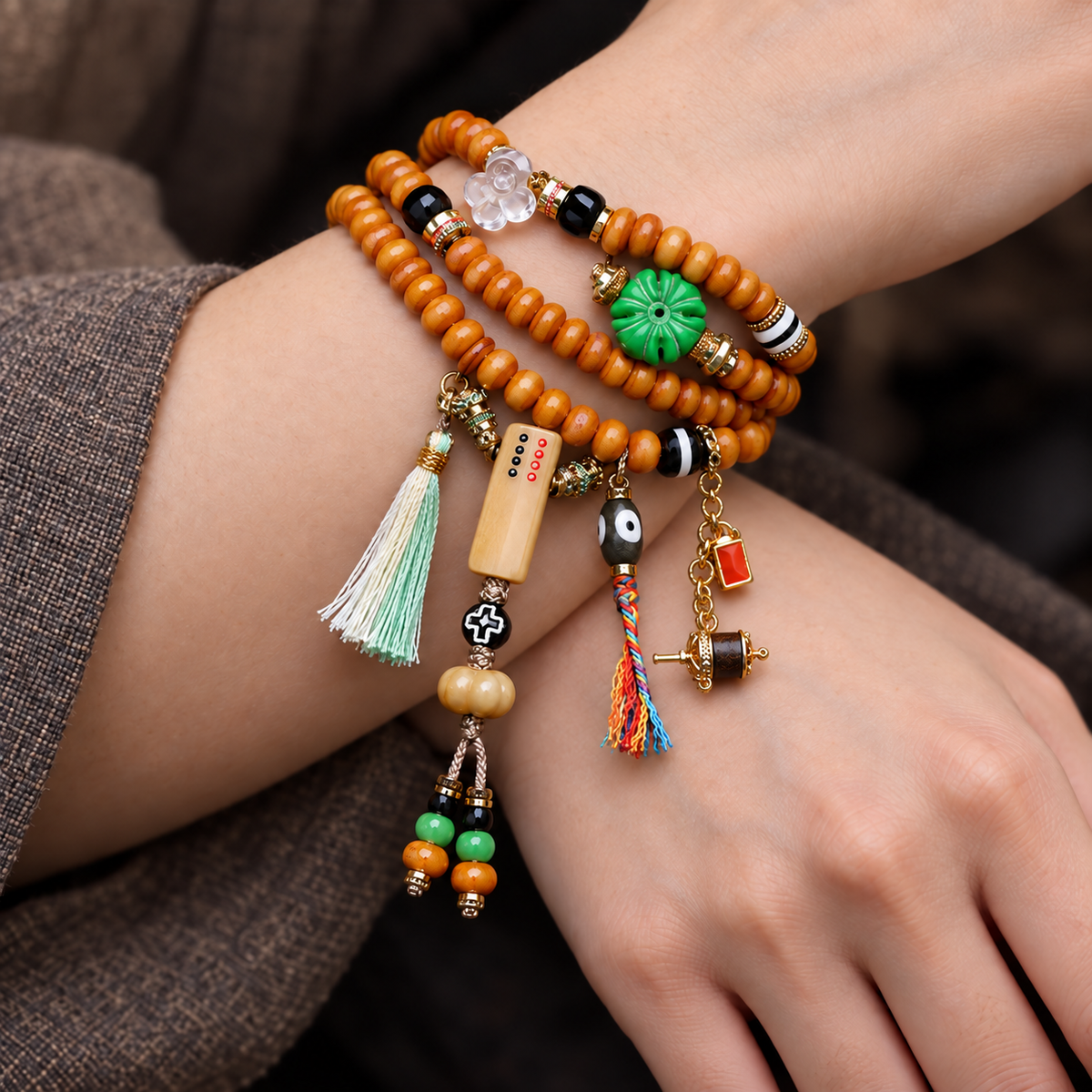 EverestArtstudios Bone 108-Bead Mala with Camel Bone and Agate Accents — wrist crossed