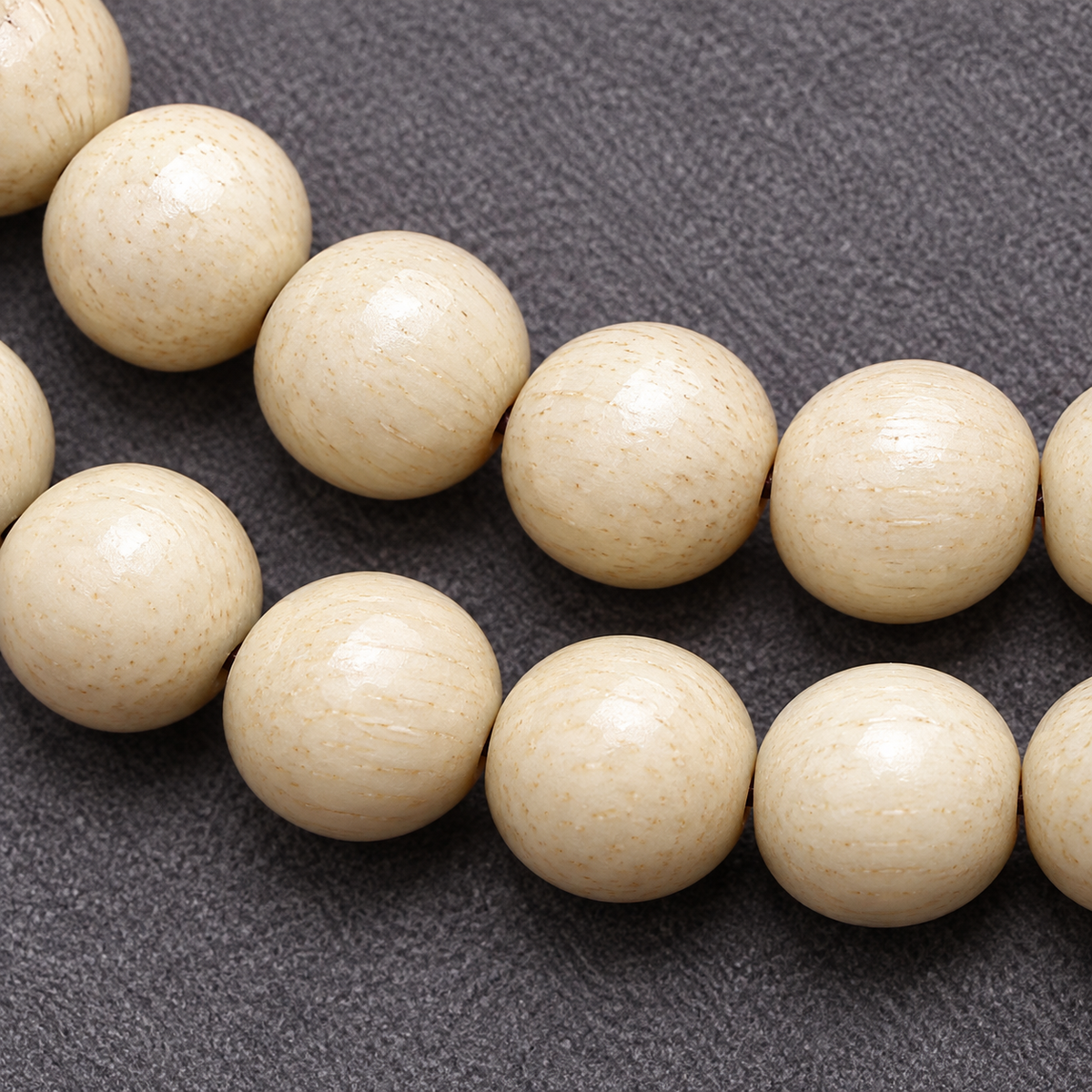 EverestArtstudios Bone 108-Bead Mala with Safety Ring and Vajra Motif Charms — bead detail