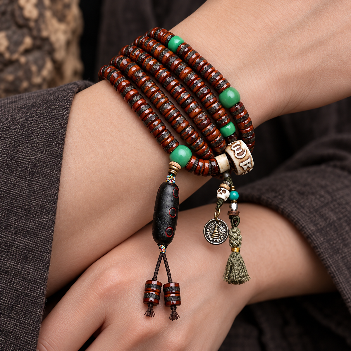 EverestArtstudios Bone 108-Bead Mala with Rahula-Inspired Pendant — wrist crossed