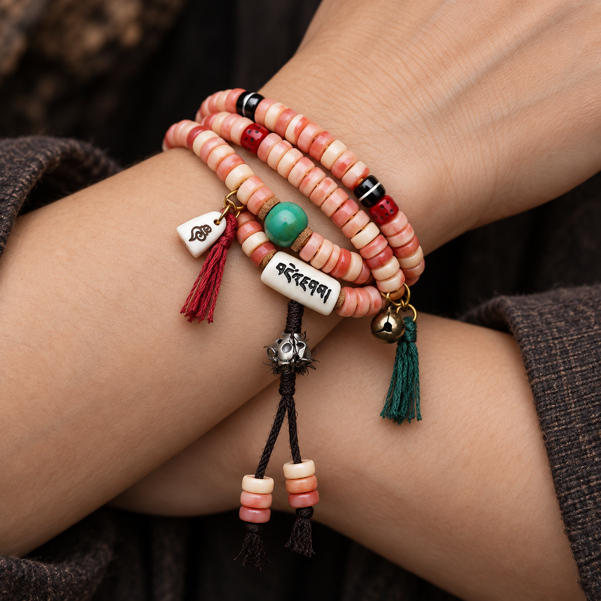 EverestArtstudios Camel Bone 108-Bead Mala with Coconut and Decorative Accents — wrist crossed