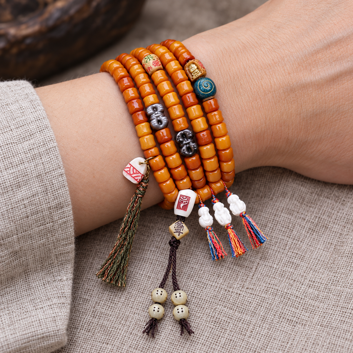 EverestArtstudios Bamboo-Carved Yak Bone 108-Bead Mala with Obsidian Accents — wrist resting