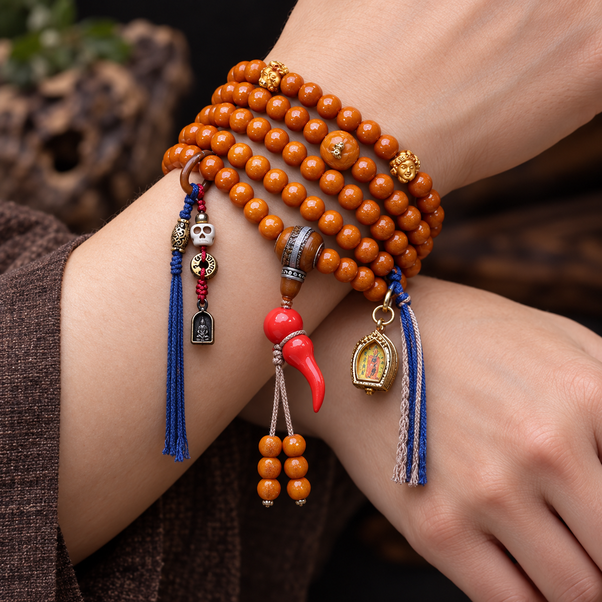EverestArtstudios Camel Bone 108-Bead Mala with Thangka-Style Ghau Pendant — wrist crossed