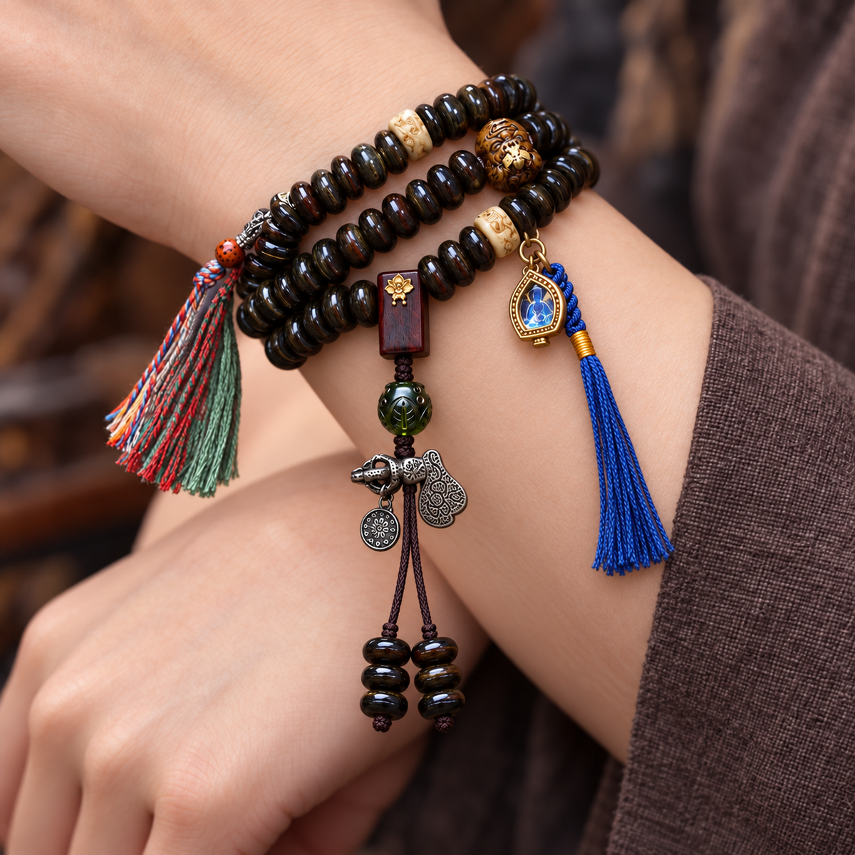 EverestArtstudios Bamboo-Pattern Bone 108-Bead Mala with Sandalwood Accents — wrist crossed