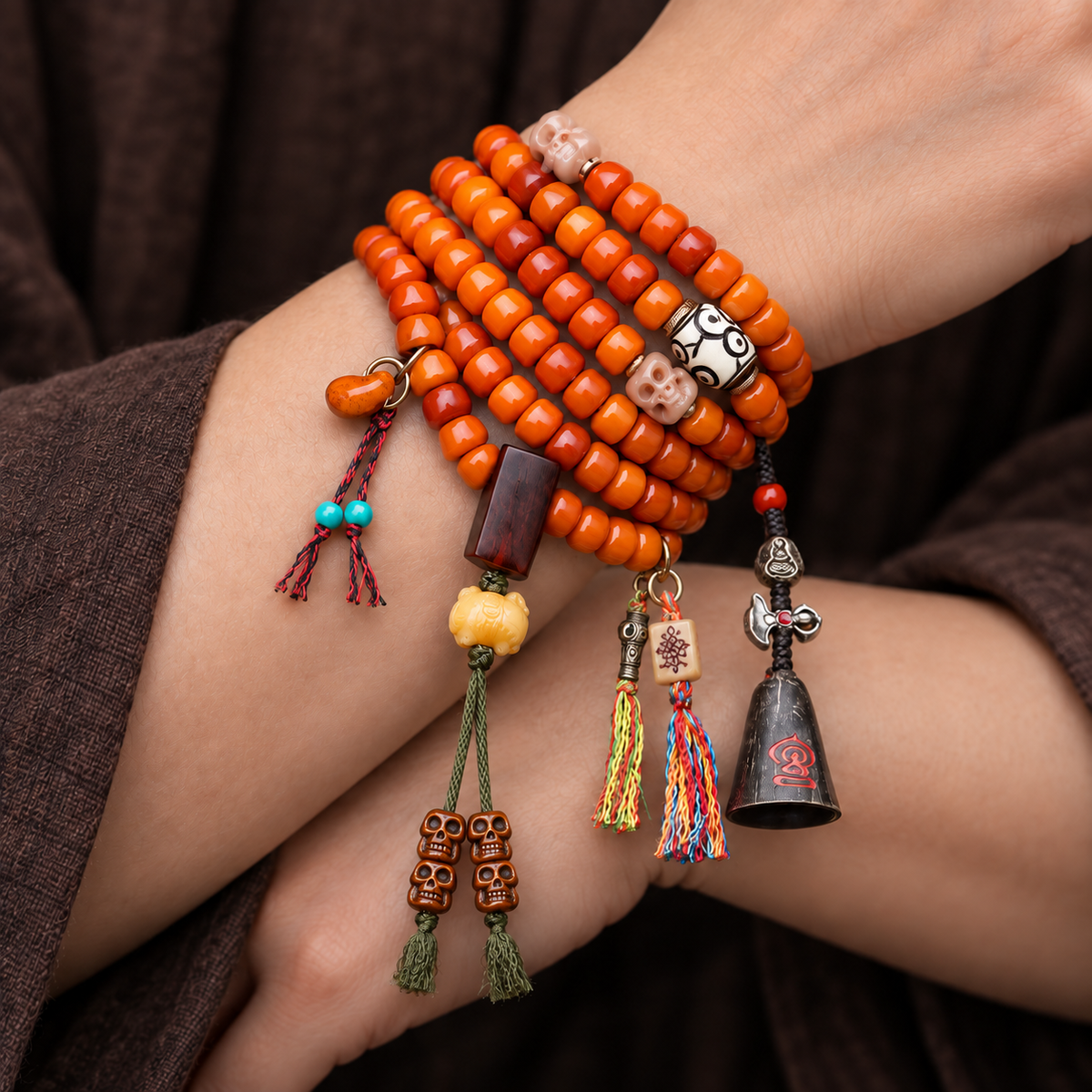 EverestArtstudios Carved Yak Bone Prayer Beads with Sandalwood Accents — wrist crossed