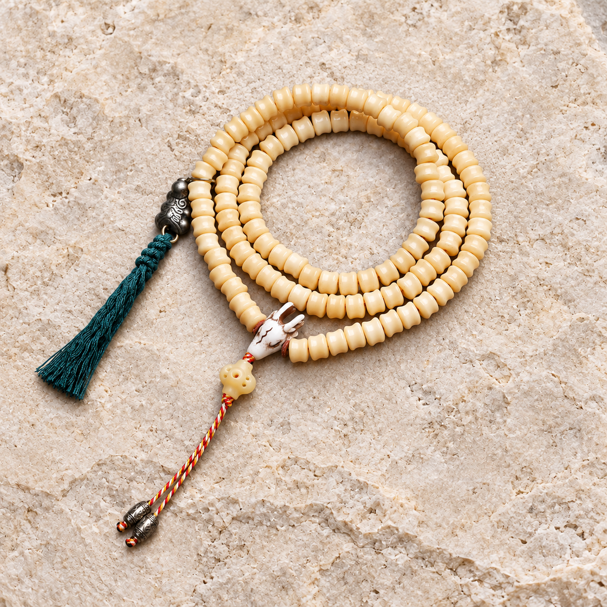 EverestArtstudios Carved Bone 108-Bead Mala with Decorative Metal Charms — overall display