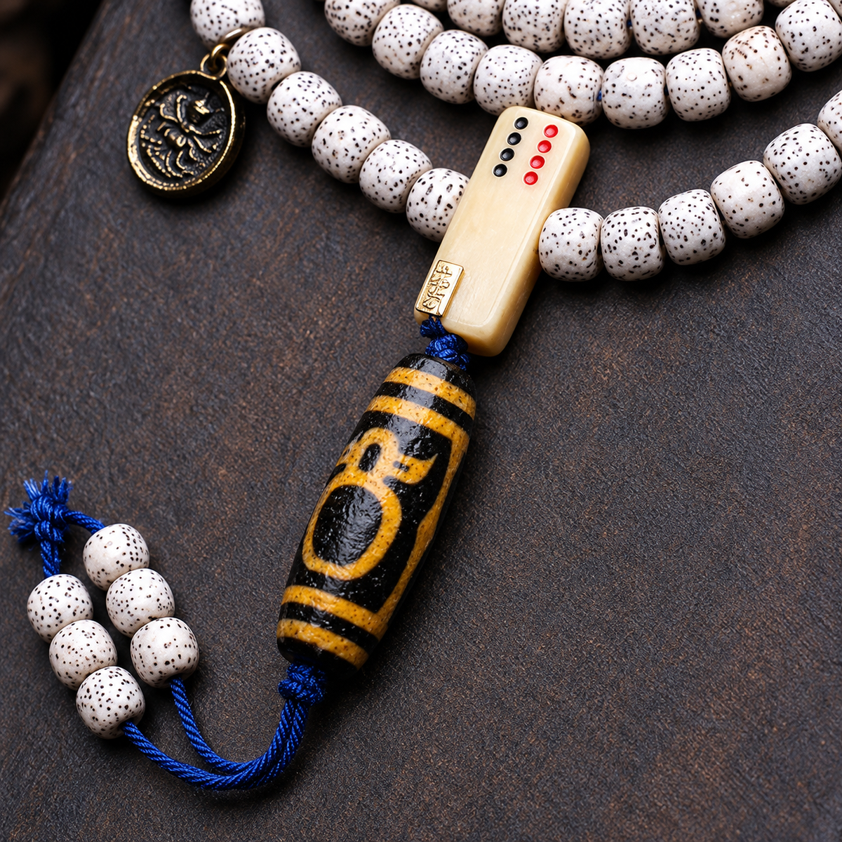 EverestArtstudios Xingyue Bodhi 108-Bead Mala with Crystal and Wealth Deity Accents — connection detail
