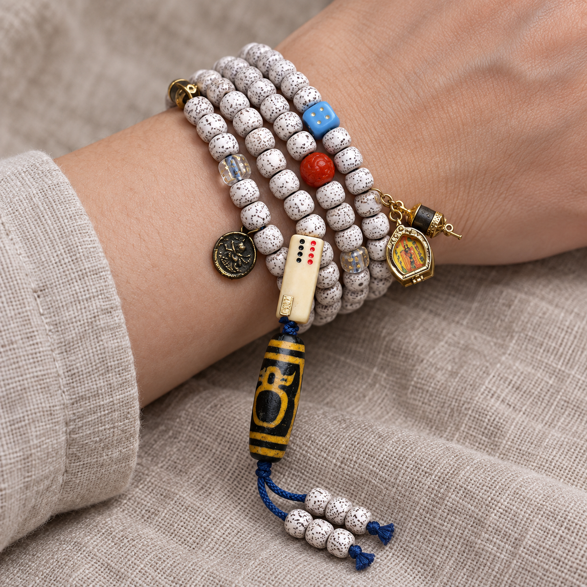 EverestArtstudios Xingyue Bodhi 108-Bead Mala with Crystal and Wealth Deity Accents — wrist resting