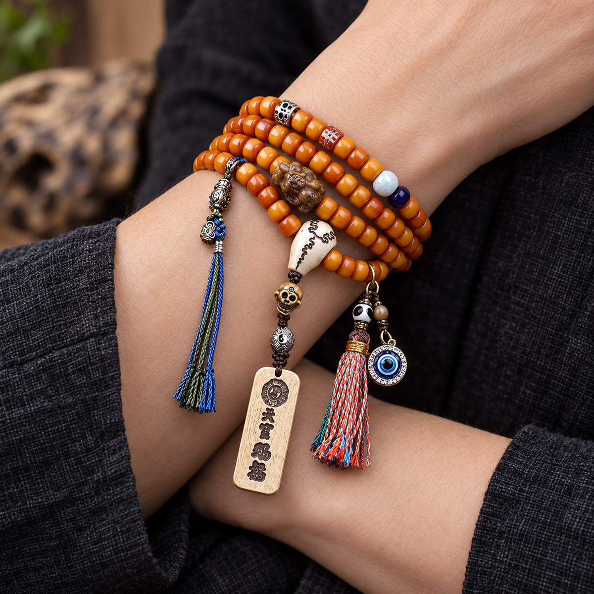EverestArtstudios Bone 108-Bead Mala with Blessing Pendant and Bird Motif Charms — wrist crossed