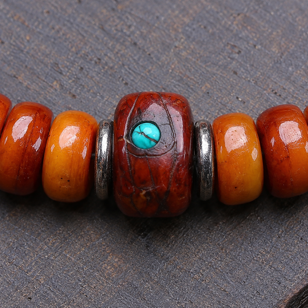 Yak bone mala with Phoenix Eye Bodhi accents — surface detail