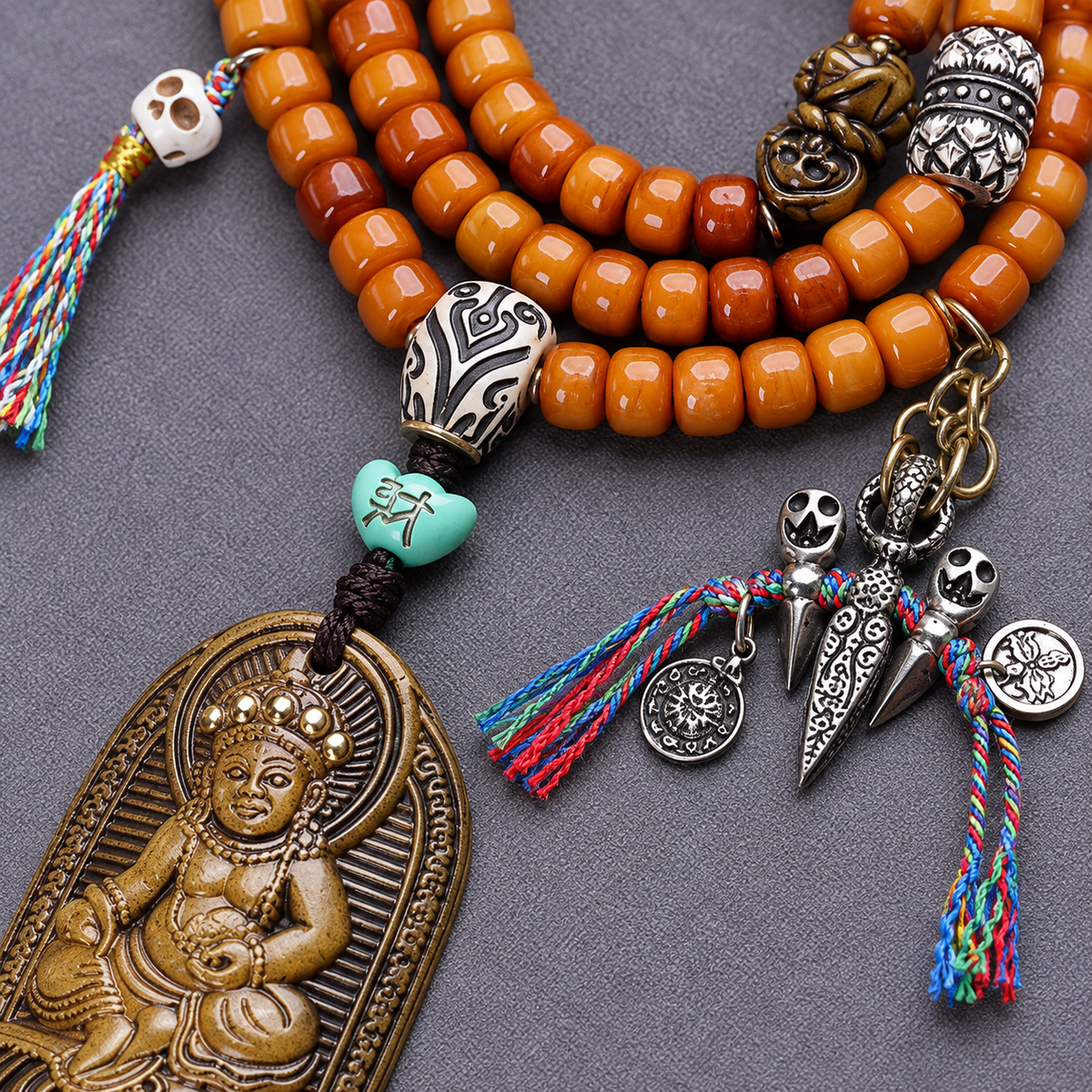 EverestArtstudios Yak Bone 108-Bead Mala with Wealth Deity Pendant and Camel Bone Accents — connection detail