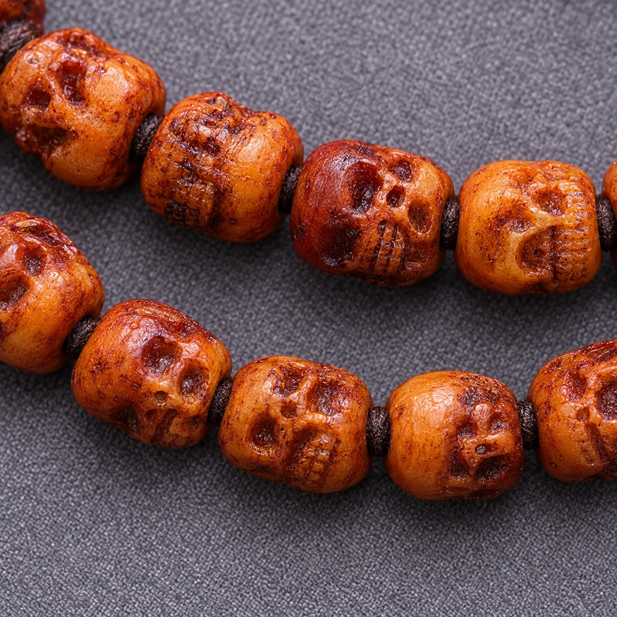 EverestArtstudios Carved Yak Bone 108-Bead Mala with Bagua and Mani Motif Charms — bead detail