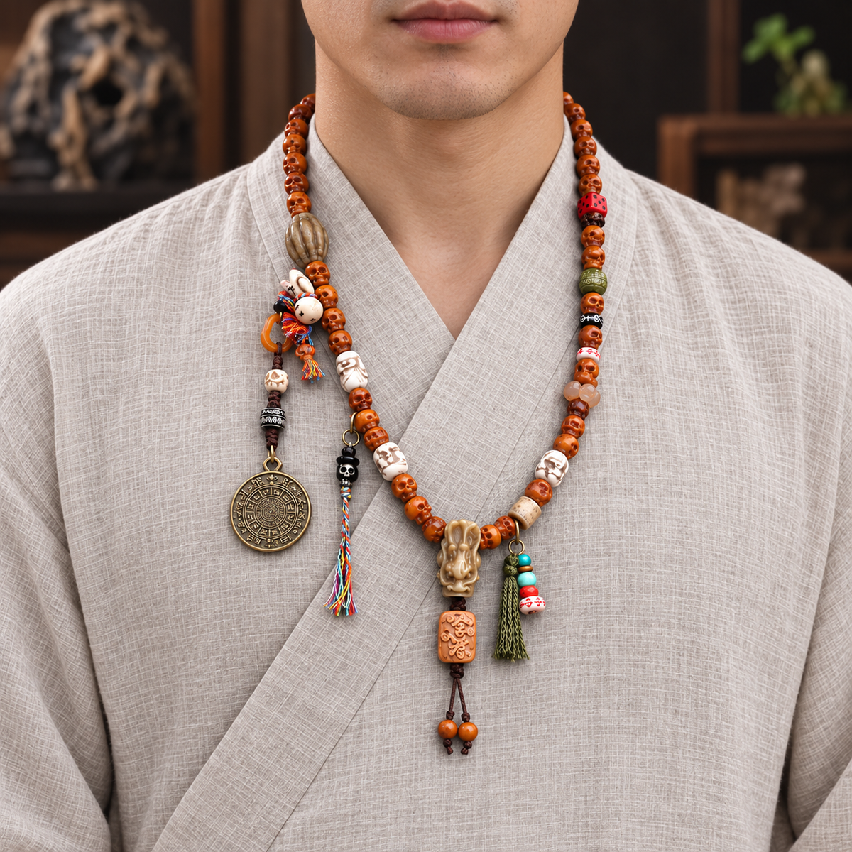 EverestArtstudios Carved Yak Bone 108-Bead Mala with Bagua and Mani Motif Charms — linen front