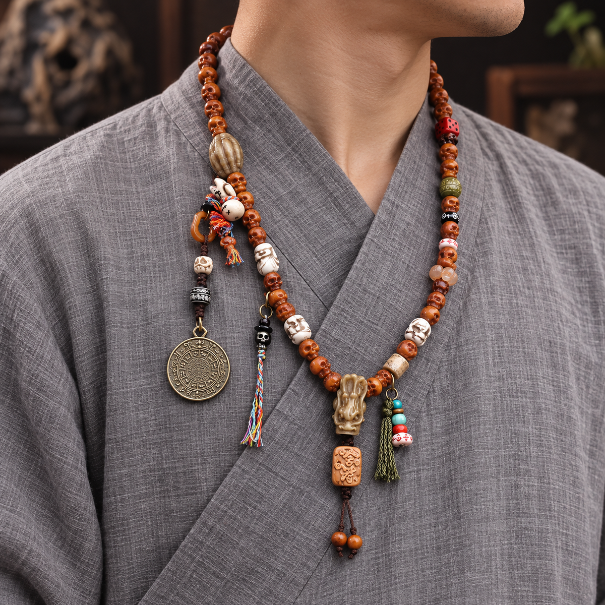 EverestArtstudios Carved Yak Bone 108-Bead Mala with Bagua and Mani Motif Charms — linen side