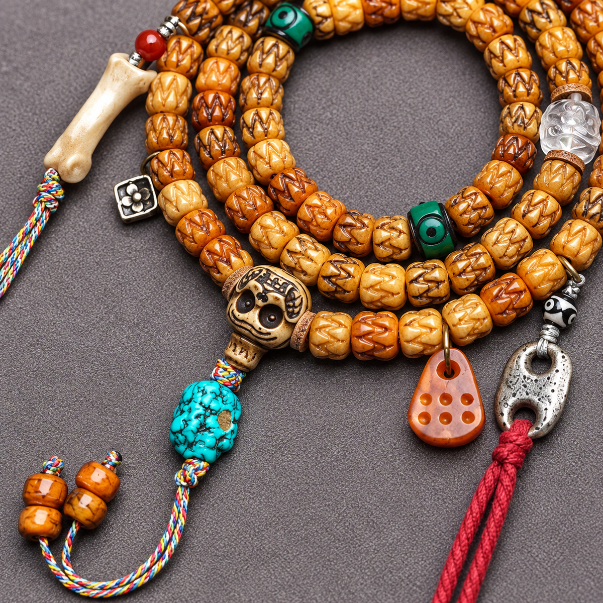 EverestArtstudios Carved Bone 108-Bead Mala with Turquoise and Glass Accents — connection detail