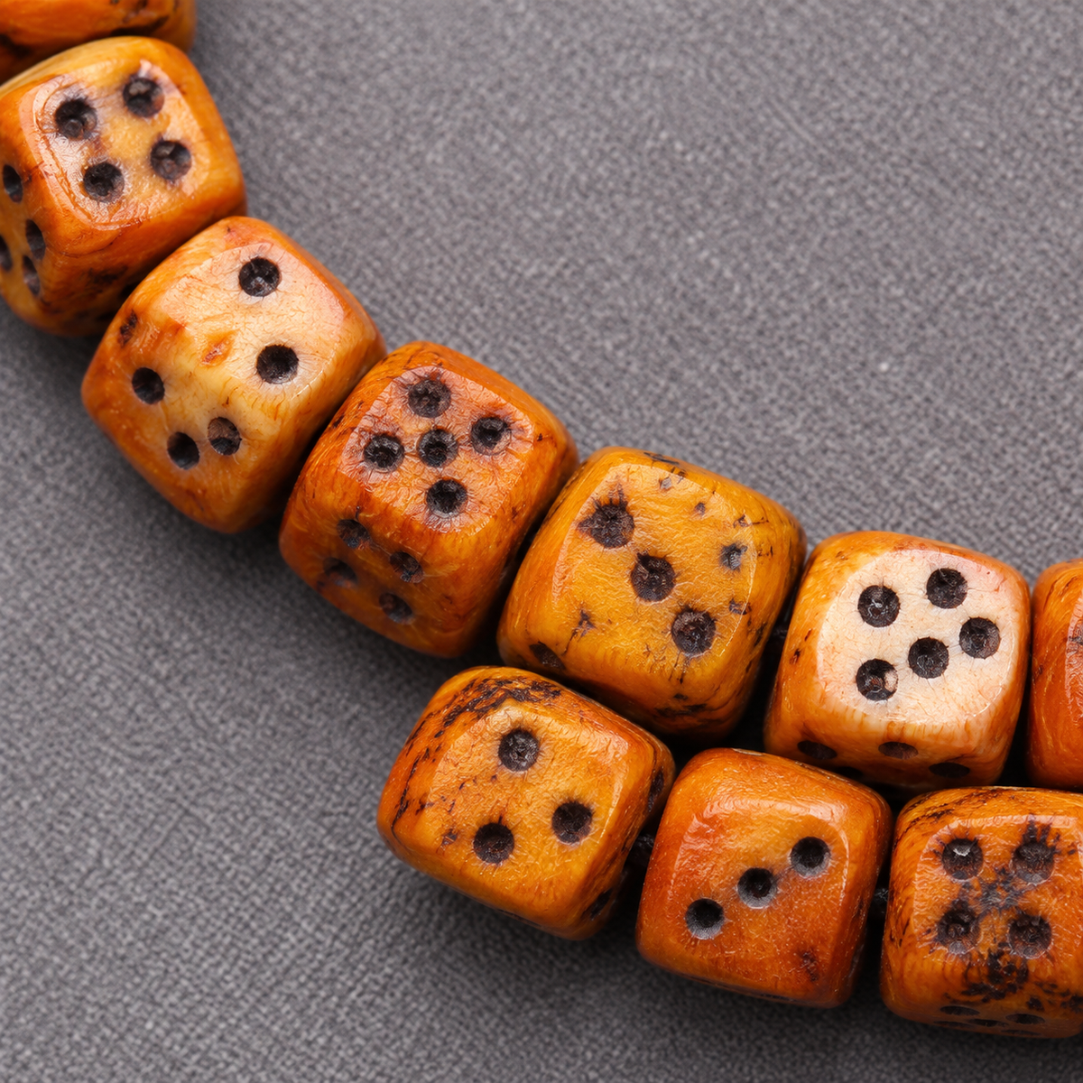EverestArtstudios Dice-Carved Yak Bone 108-Bead Mala with Camel Bone Accents — bead detail