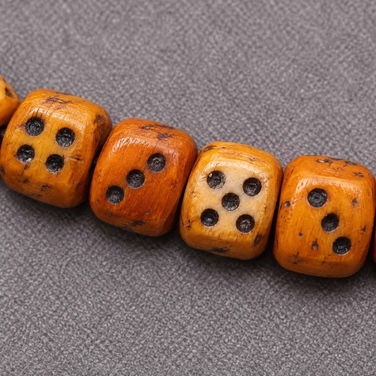 EverestArtstudios Dice-Carved Yak Bone 108-Bead Mala with Camel Bone Accents — surface detail