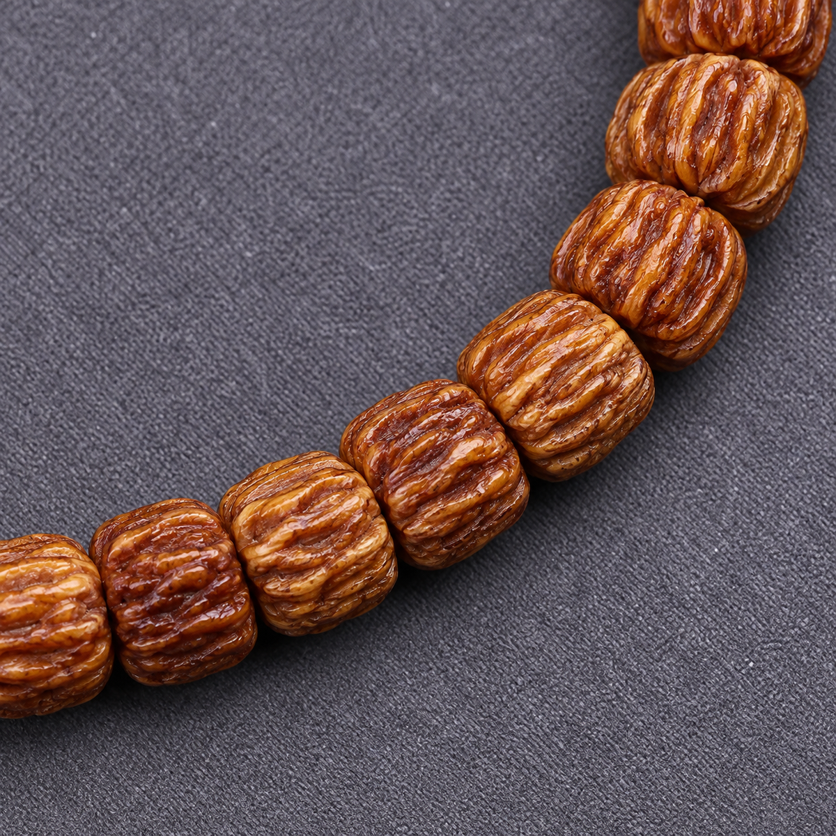 EverestArtstudios Carved Yak Bone 108-Bead Mala with Camel Bone and Sandalwood Accents — bead detail