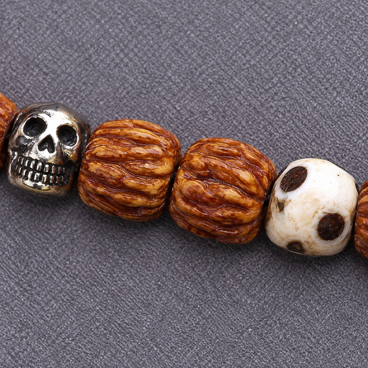 EverestArtstudios Carved Yak Bone 108-Bead Mala with Camel Bone and Sandalwood Accents — surface detail