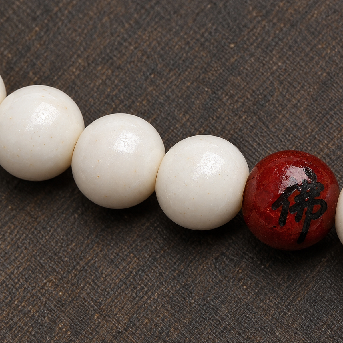 EverestArtstudios Antler 108-Bead Mala with Carved Accents and Fortune Charms — surface detail