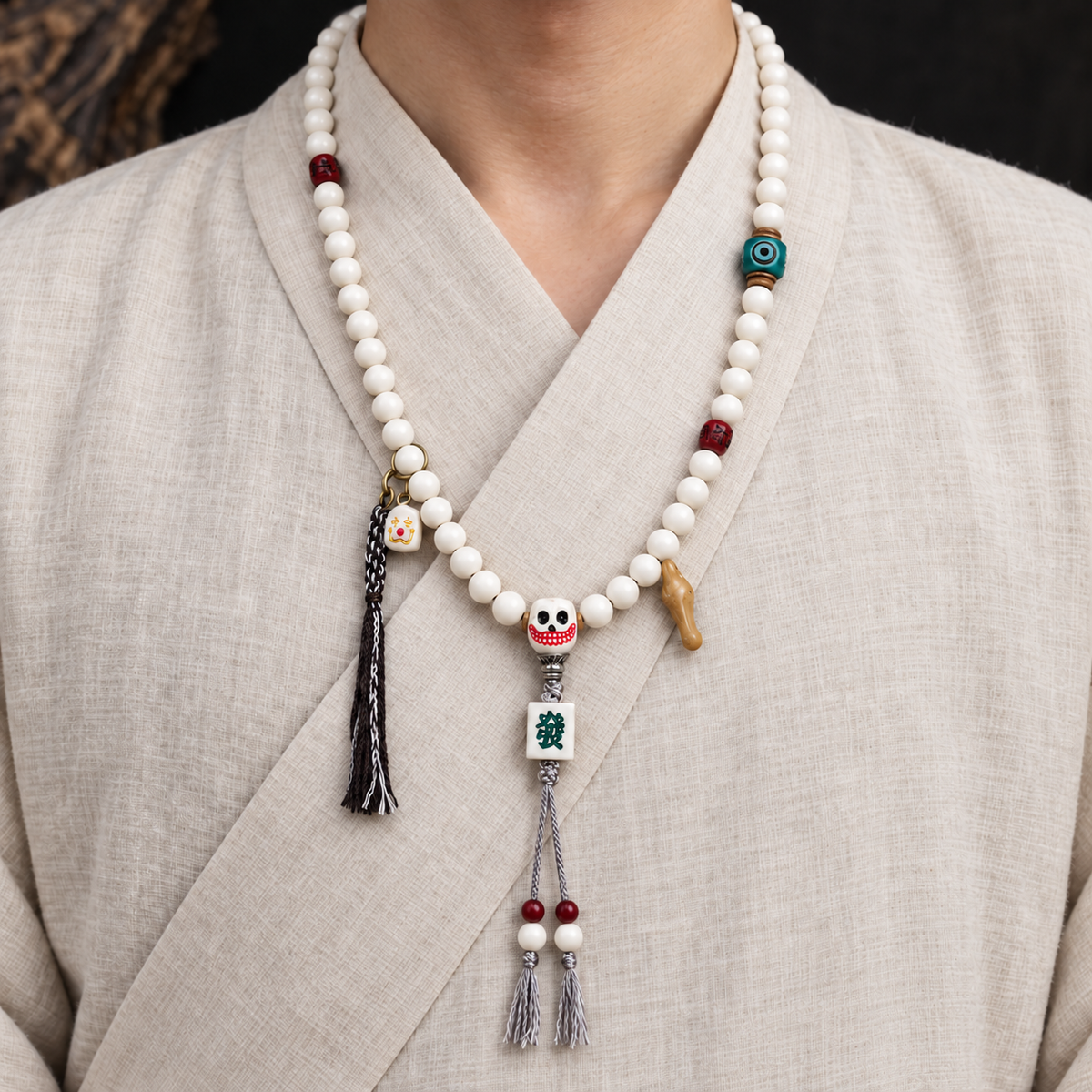 EverestArtstudios Antler 108-Bead Mala with Carved Accents and Fortune Charms — linen front