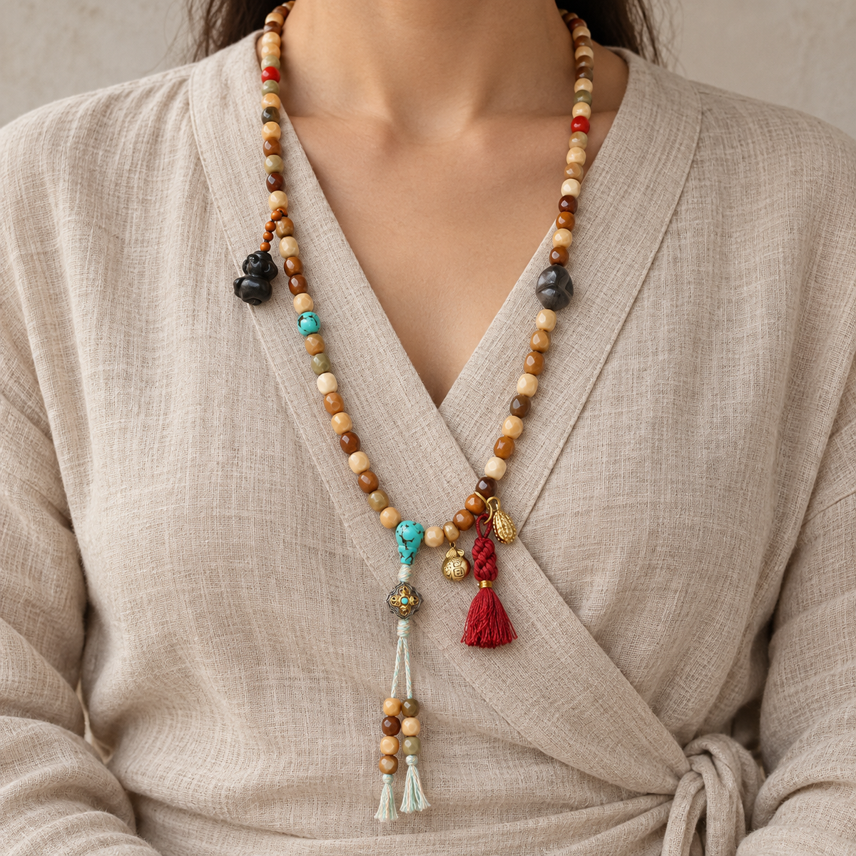 EverestArtstudios Faceted Bodhi 108-Bead Mala with Turquoise and Obsidian Accents — linen front
