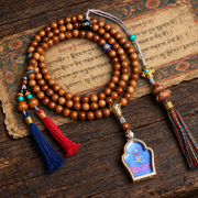EverestArtstudios Medicine Buddha Symbol 108-Bead Mala with Brown Beads and Colorful Tassels — full product
