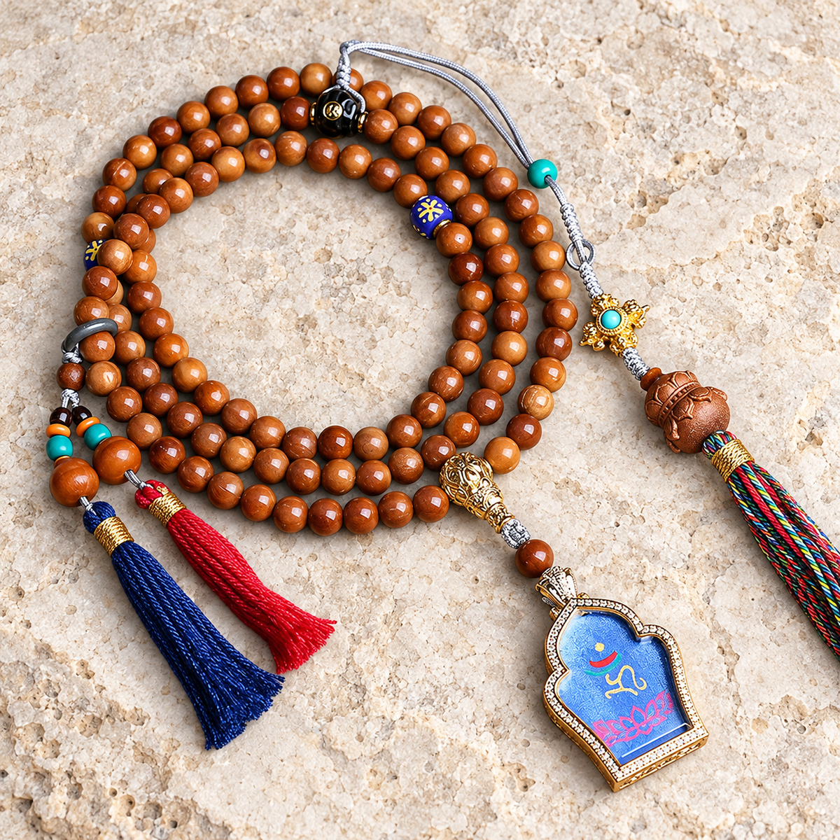 EverestArtstudios Medicine Buddha Symbol 108-Bead Mala with Brown Beads and Colorful Tassels — overall display