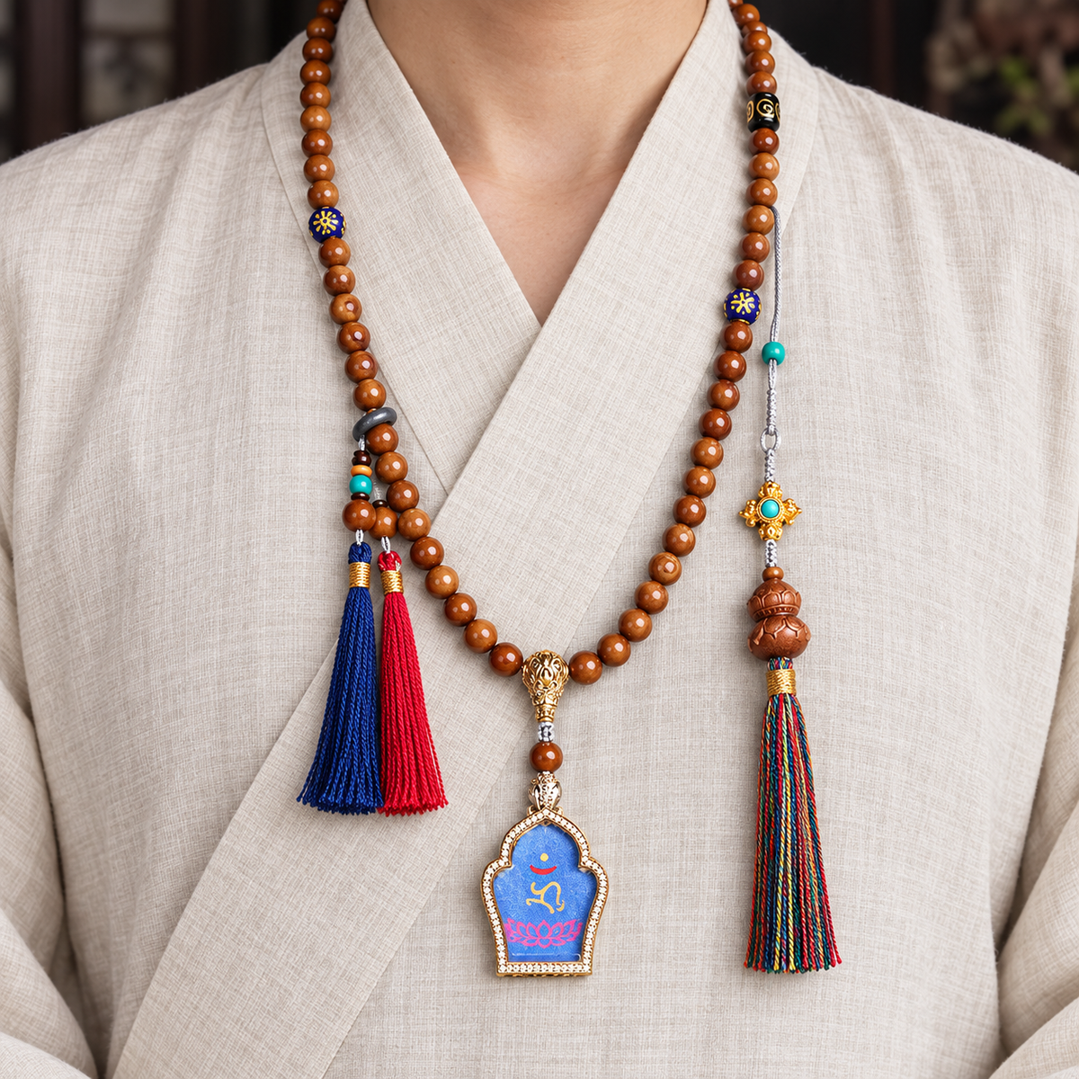 EverestArtstudios Medicine Buddha Symbol 108-Bead Mala with Brown Beads and Colorful Tassels — linen front