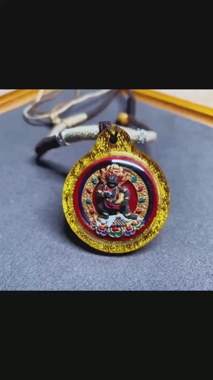 Load video: Hand-Painted Black Jambhala Medicine Tsa Tsa Necklace, Tibetan Buddhist Thangka Amulet, Mineral Pigment Folk Art, Spiritual Gift for Wealth